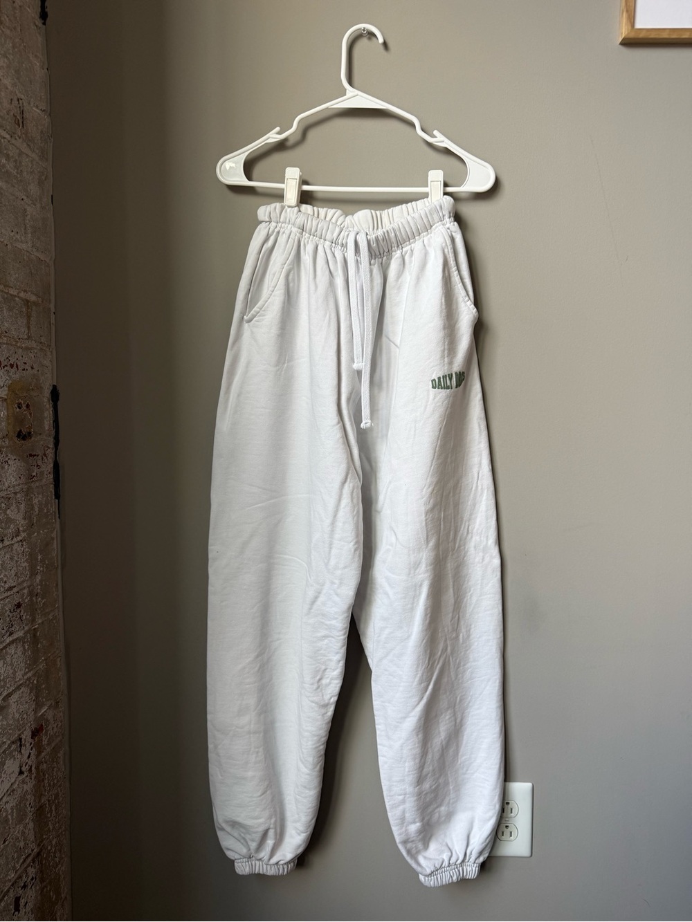 Daily Drills White Jogger Sweatpants with Green Logo